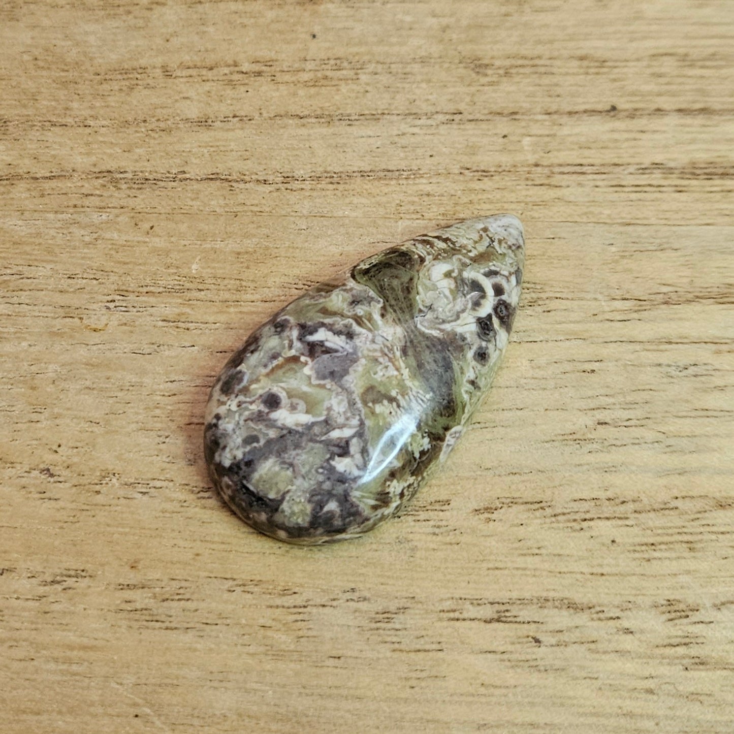 Rainforest Rhyolite Tear-drop Cabochon.