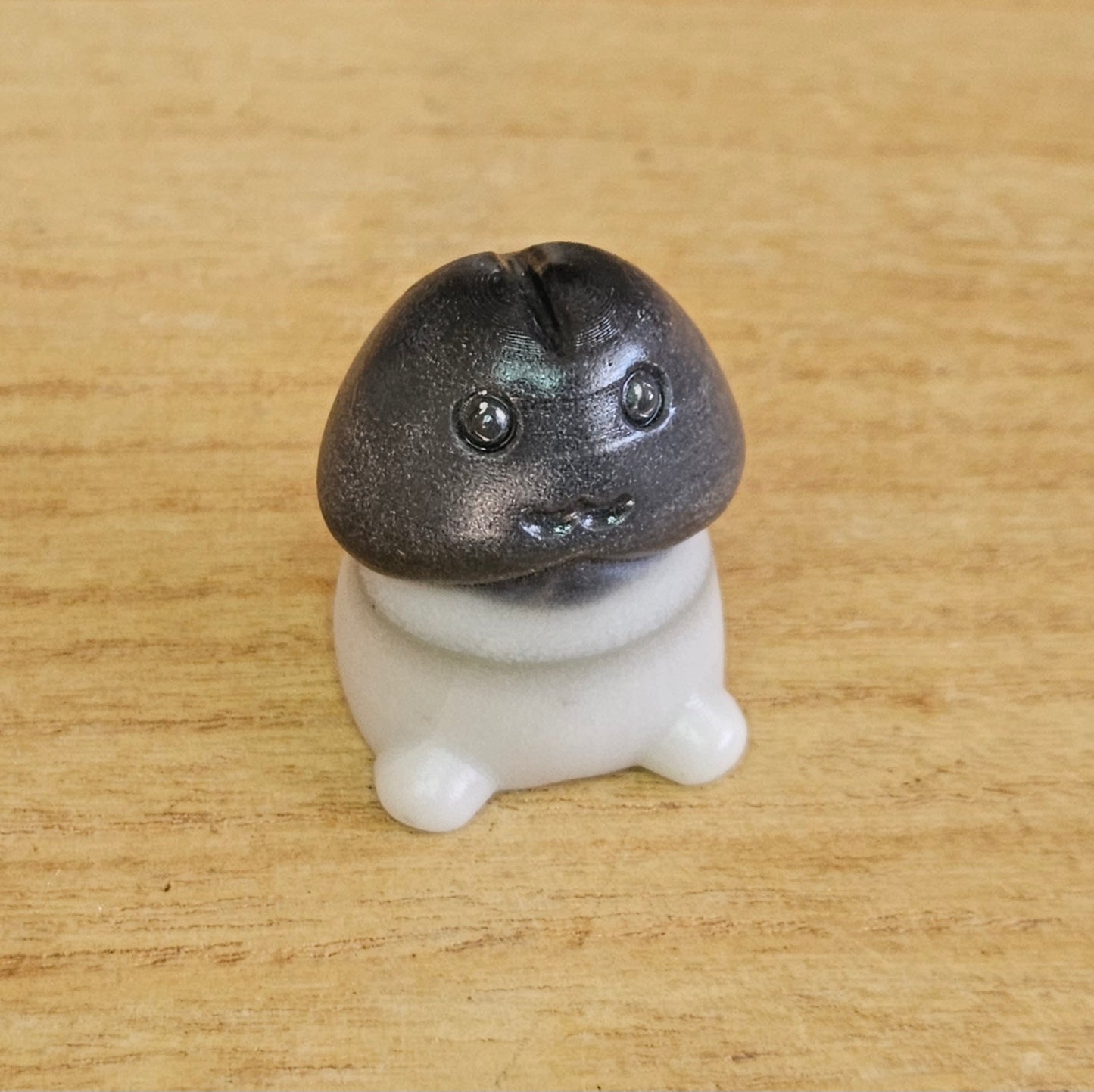 Taiji Jade Happy Ding Ding Carving.