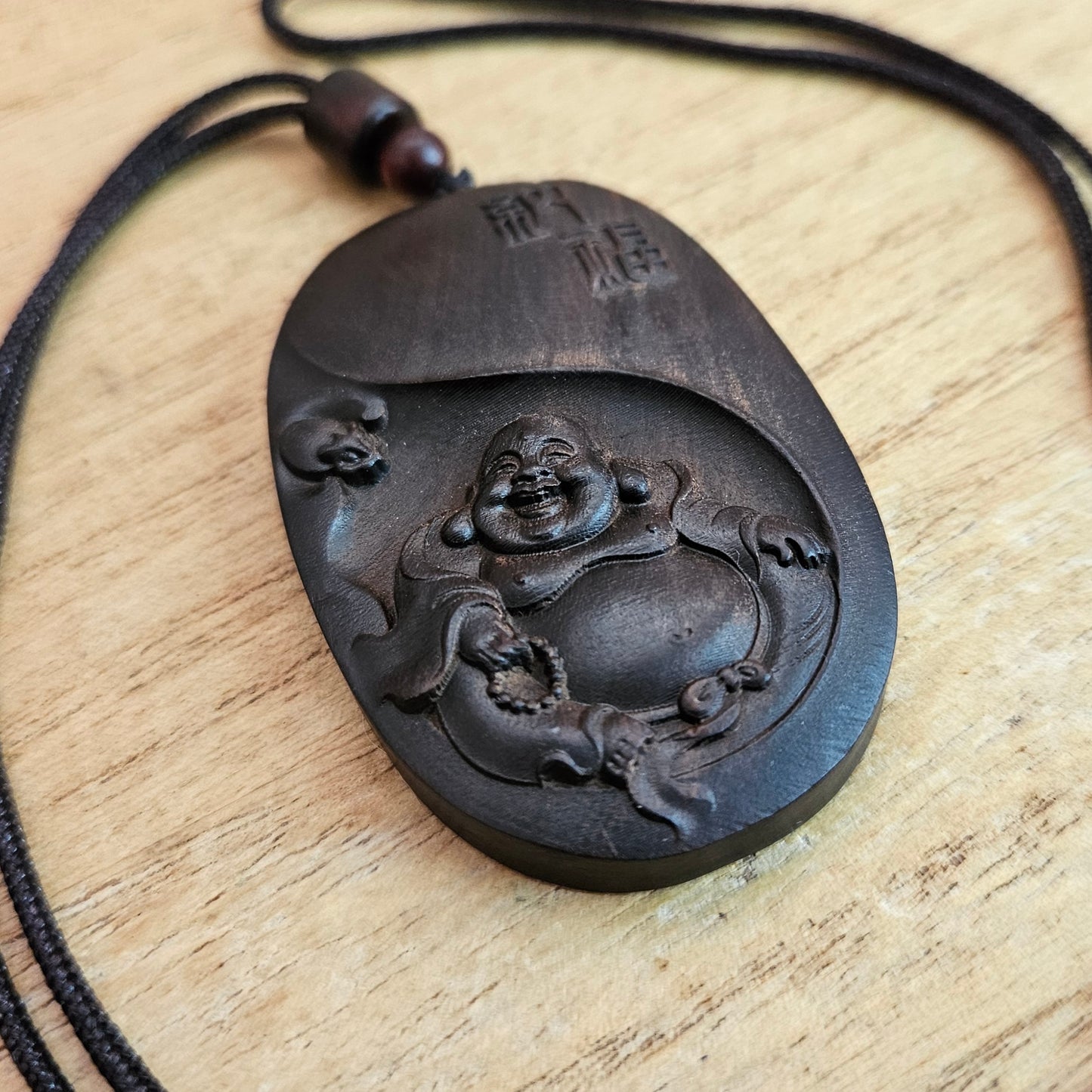 Wooden Buddha Pendant and Cord Necklace.