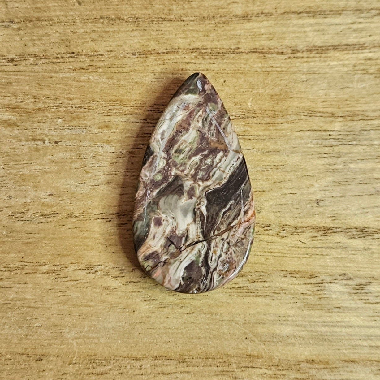 Rainforest Rhyolite Tear-drop Cabochon.