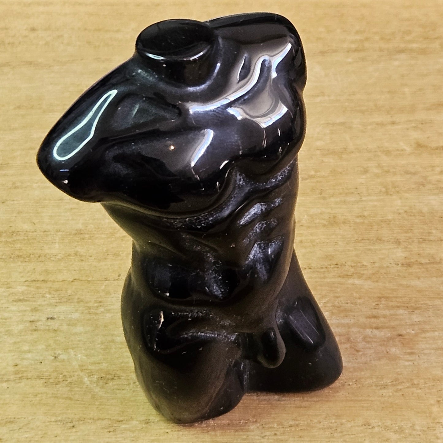 Silver Sheen Obsidian Male Body Carving.