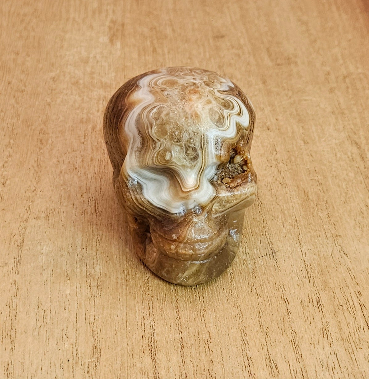 Banded Amber Calcite Skull Carving.