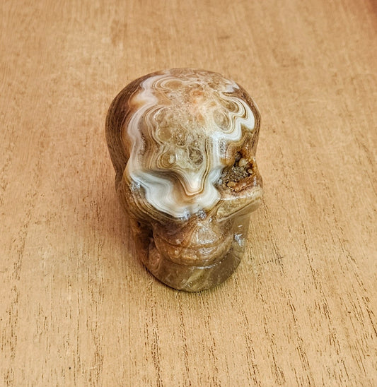 Banded Amber Calcite Skull Carving.