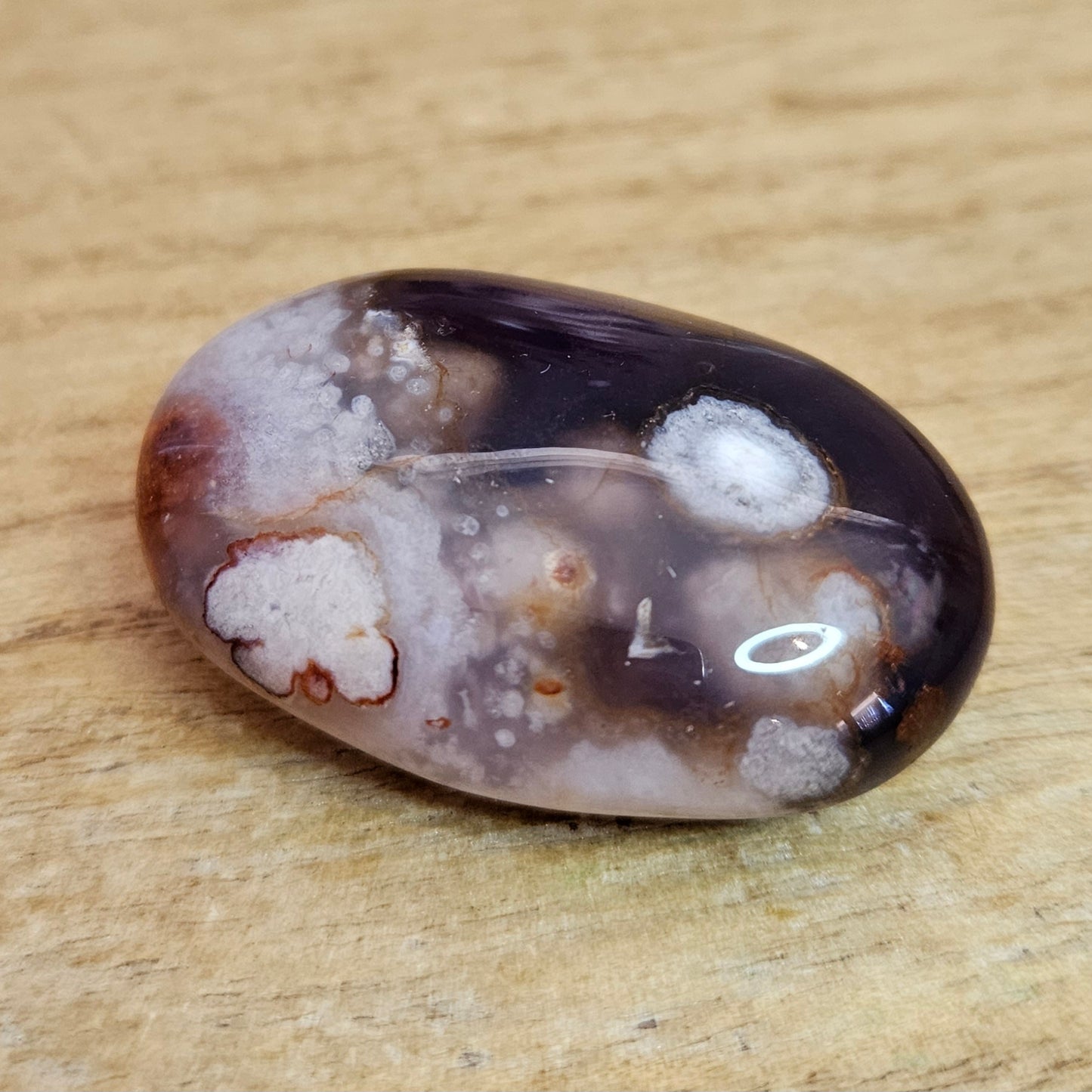 Black Flower Agate Palmstone.