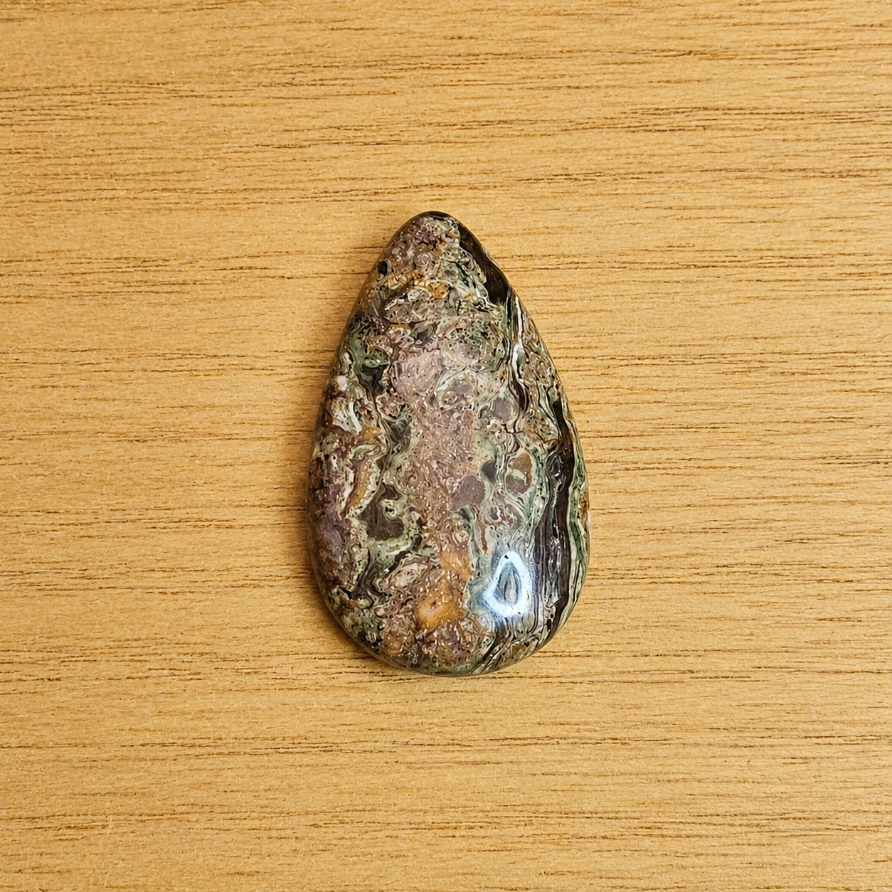 Rainforest Rhyolite Tear-drop Cabochon.
